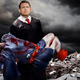 Chief Justice John Roberts cradles the body of his beloved sidekick, Kid Justice.